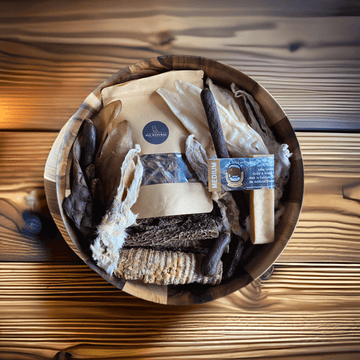 Dim Gray Puppy treat box with sprats.